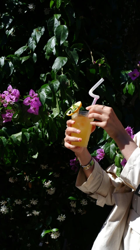 the woman is enjoying her drink by herself