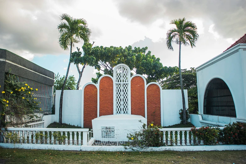 a building in a city park that looks like a shrine