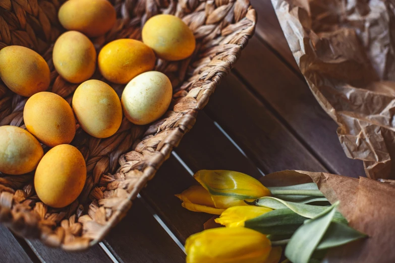 two brown baskets filled with fresh picked fruit