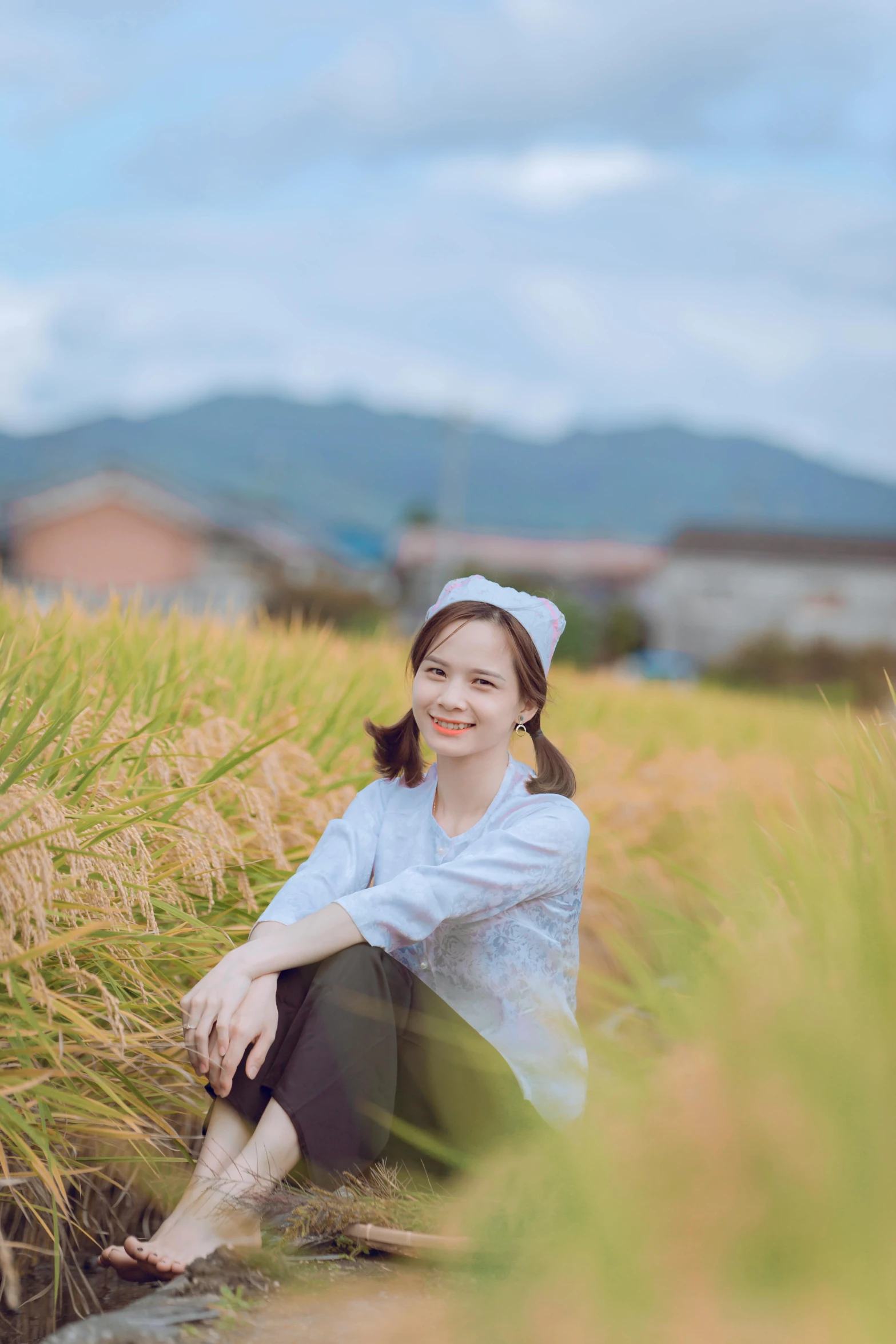 a  smiles for the camera in the middle of a field