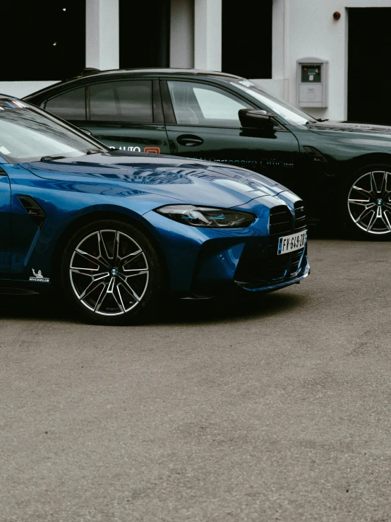 three cars parked in the parking lot outside