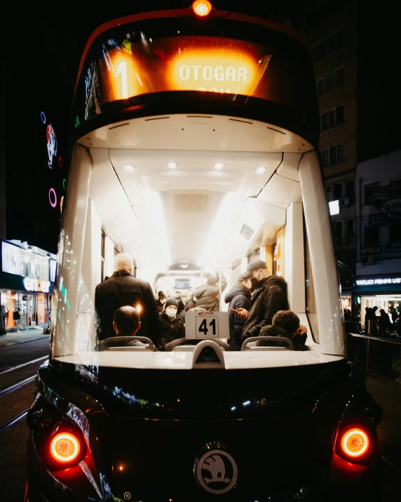 an odd view of a back end of a bus