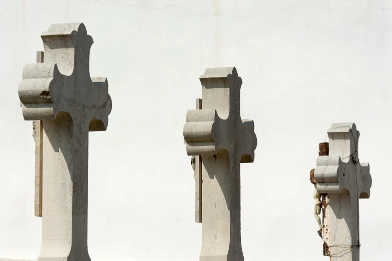 architectural sculptures against a light colored sky