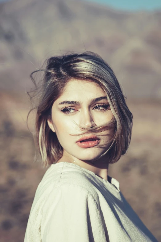 a young woman with fake mustaches and nose ring