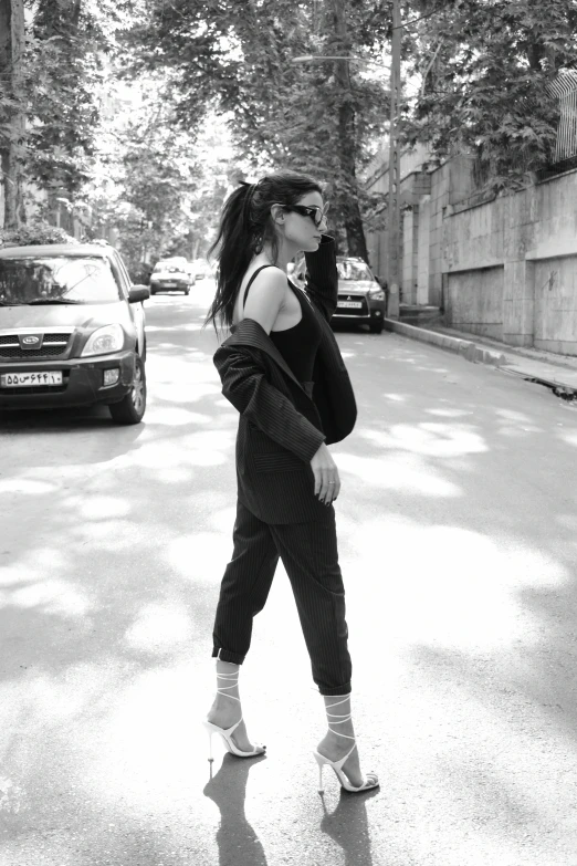 a pregnant woman walking on the street