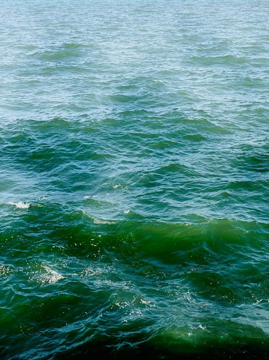 some water waves some green and yellow colors