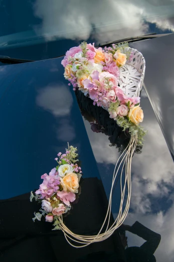 an image of a wedding car decoration