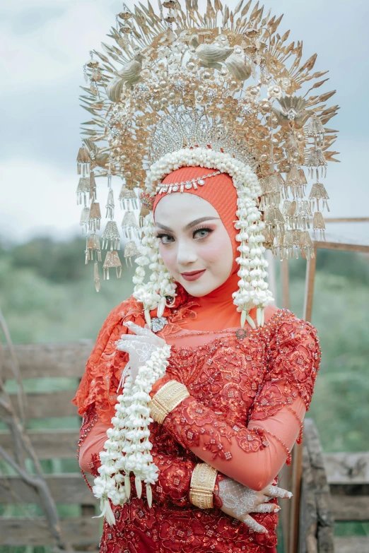 woman dressed as an oriental court with beaded headpiece