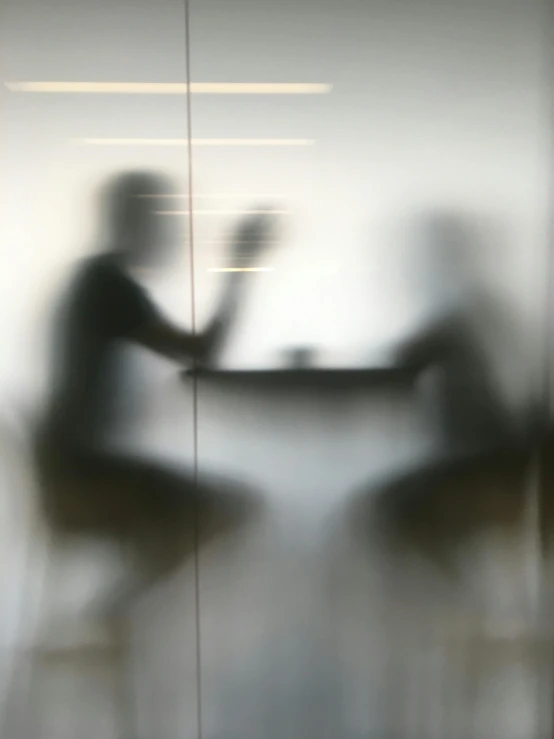 an image of the two people sitting in the lobby