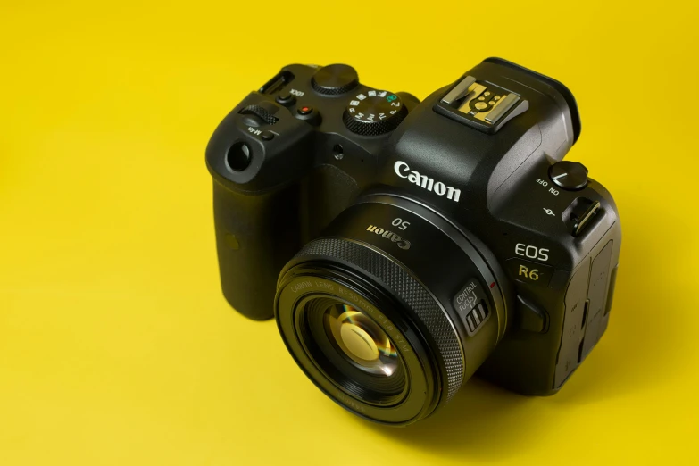 the camera has been placed on a yellow background