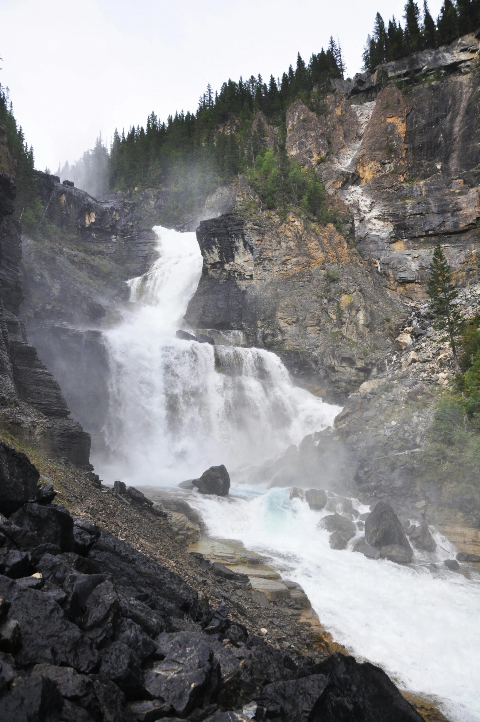 a waterfall with some water coming out of it