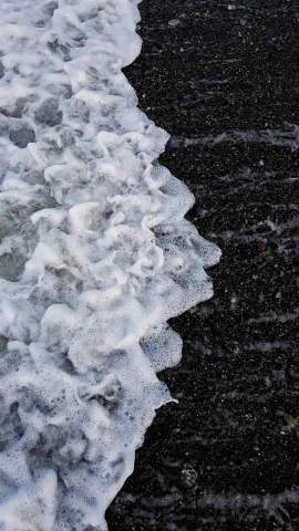 the waves of the sea hitting the shore