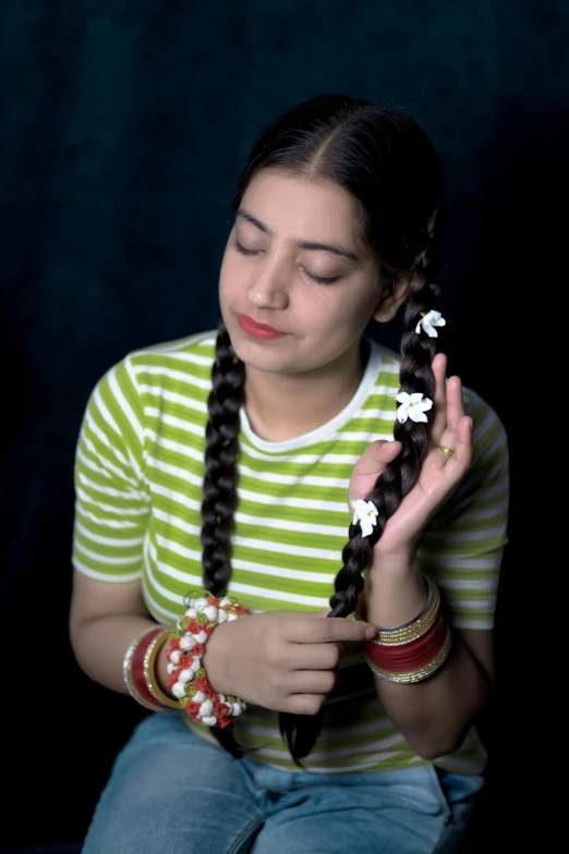 a woman with ids and ring - rings sitting down