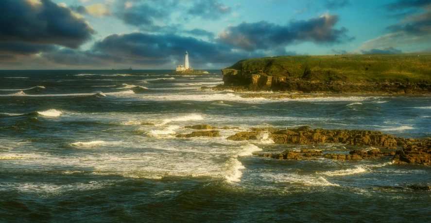 some water and a lighthouse on some rocks