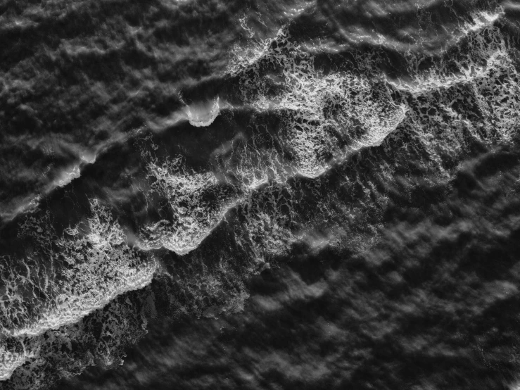 abstract pograph of the ocean waves, seen from above