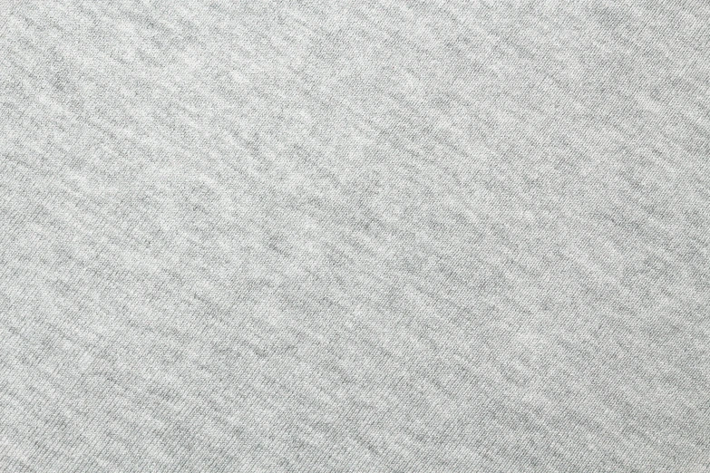 a white surface with random small patterns