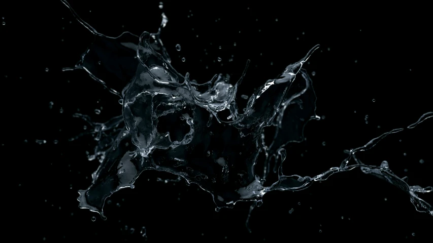 water splashing on black background in light