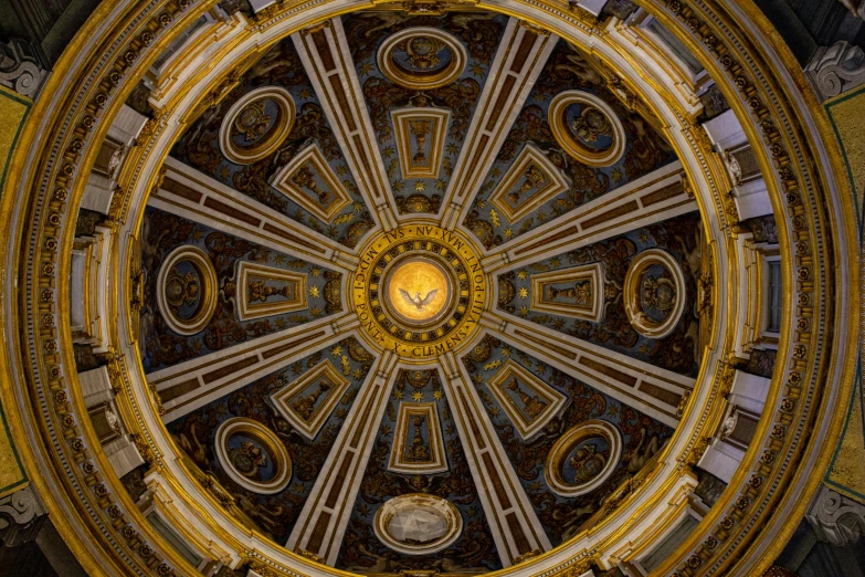 the inside of an ornate domed building