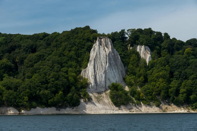 a river is shown with some trees and rocks