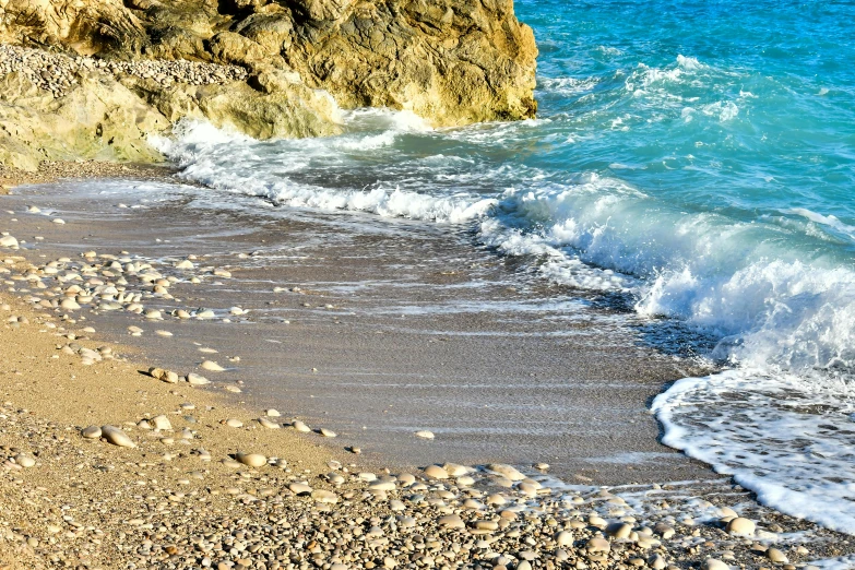 the beach is covered with water and waves coming to shore