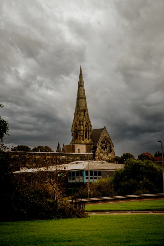 a picture of a church with green grass