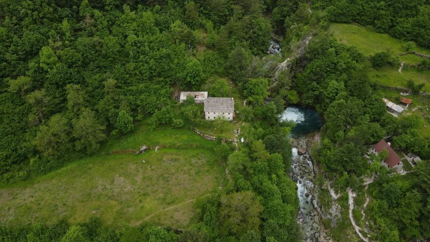 an aerial s of an abandoned building and river