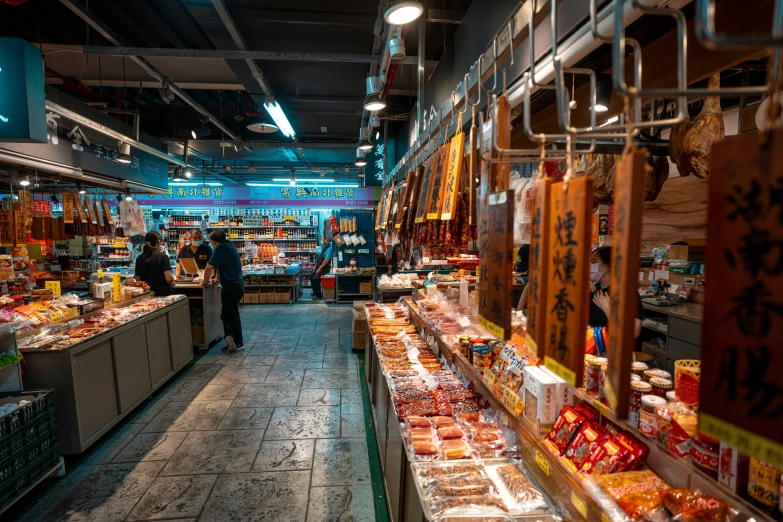 inside of a market with a lot of food