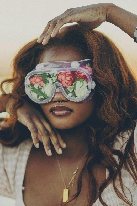 a close up of a person with flowers on their blind