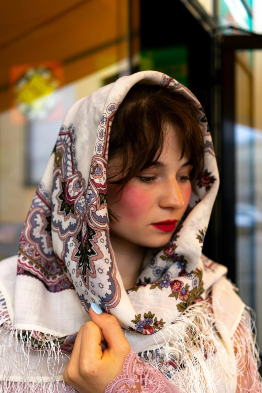 a young woman with short hair and a veil