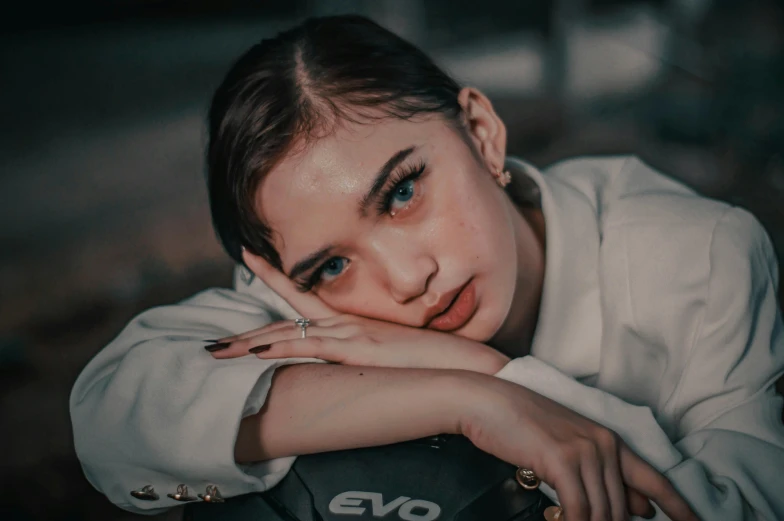 an up close po of a woman with short brown hair and blue eyes