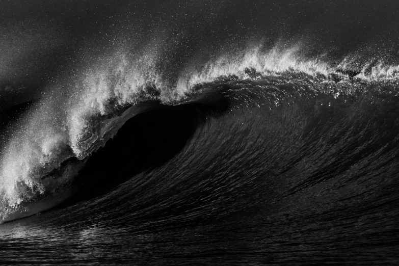 black and white pograph of a large wave