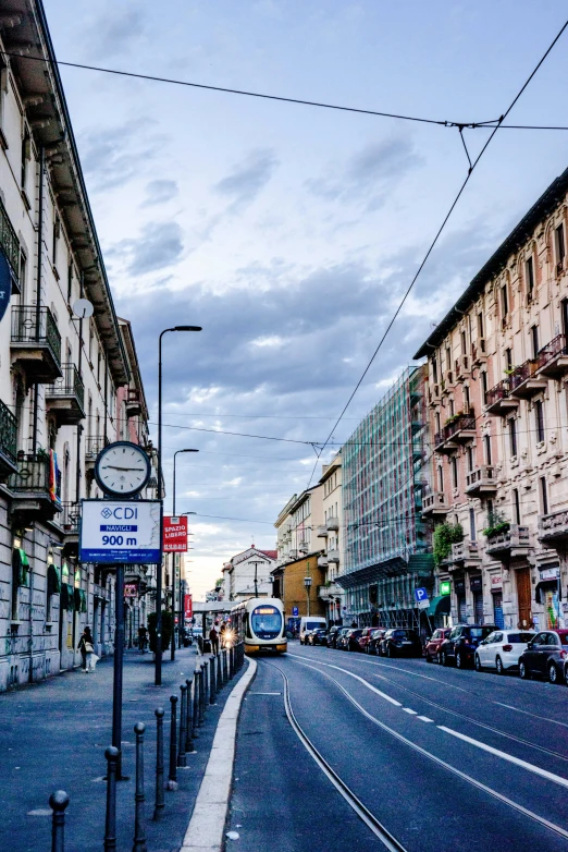 two buildings in the middle of an empty street