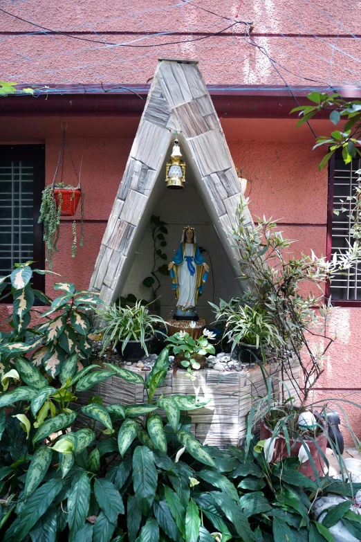 the door of a house is open, revealing an outdoor garden