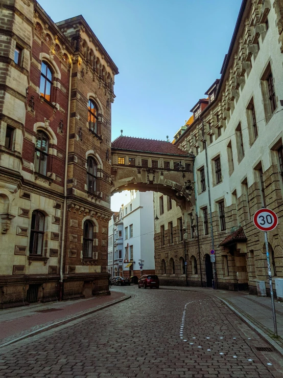 there are two archways with stone buildings