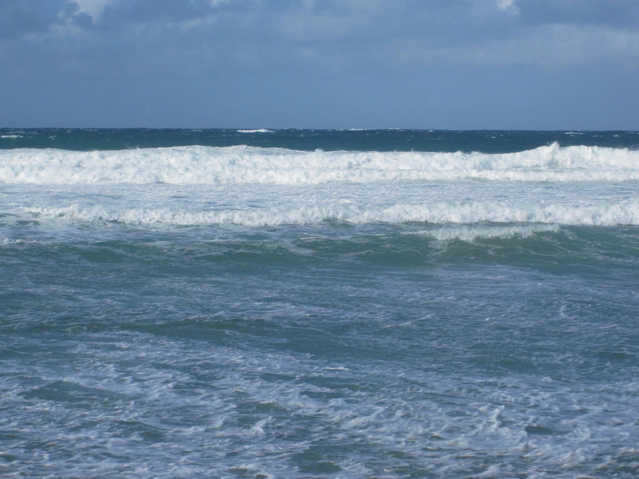 there are waves that are coming in to the beach