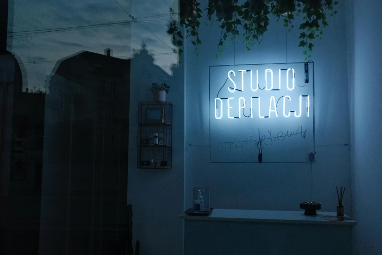 there is a neon sign that says studio switch