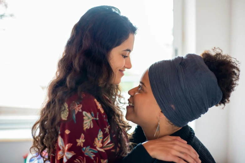 an image of two women that are talking