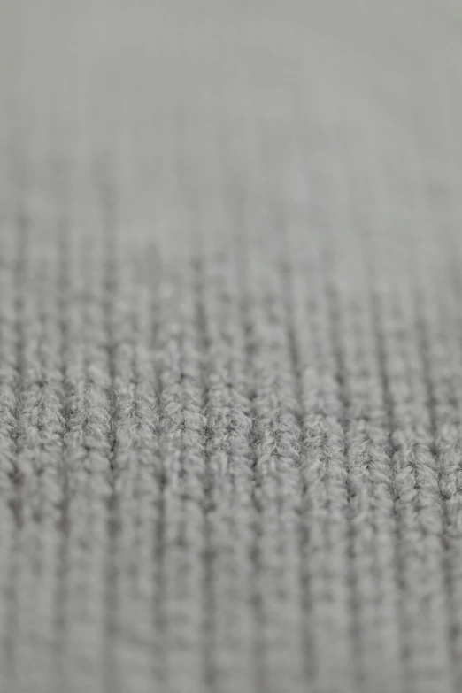 a close up of some gray lines on fabric