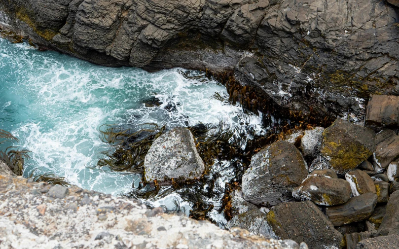 some rocky waters near the edge of a cliff