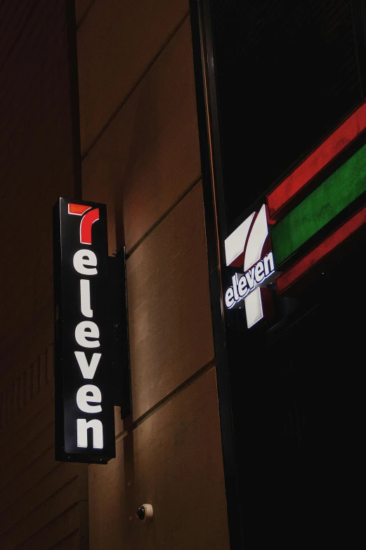 a pizza oven is neon red, black and white