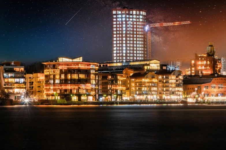 night view of city lights and buildings with fireworks