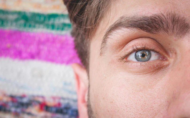 an extreme close up of a man's eye