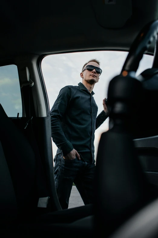 a man standing in the back of a truck