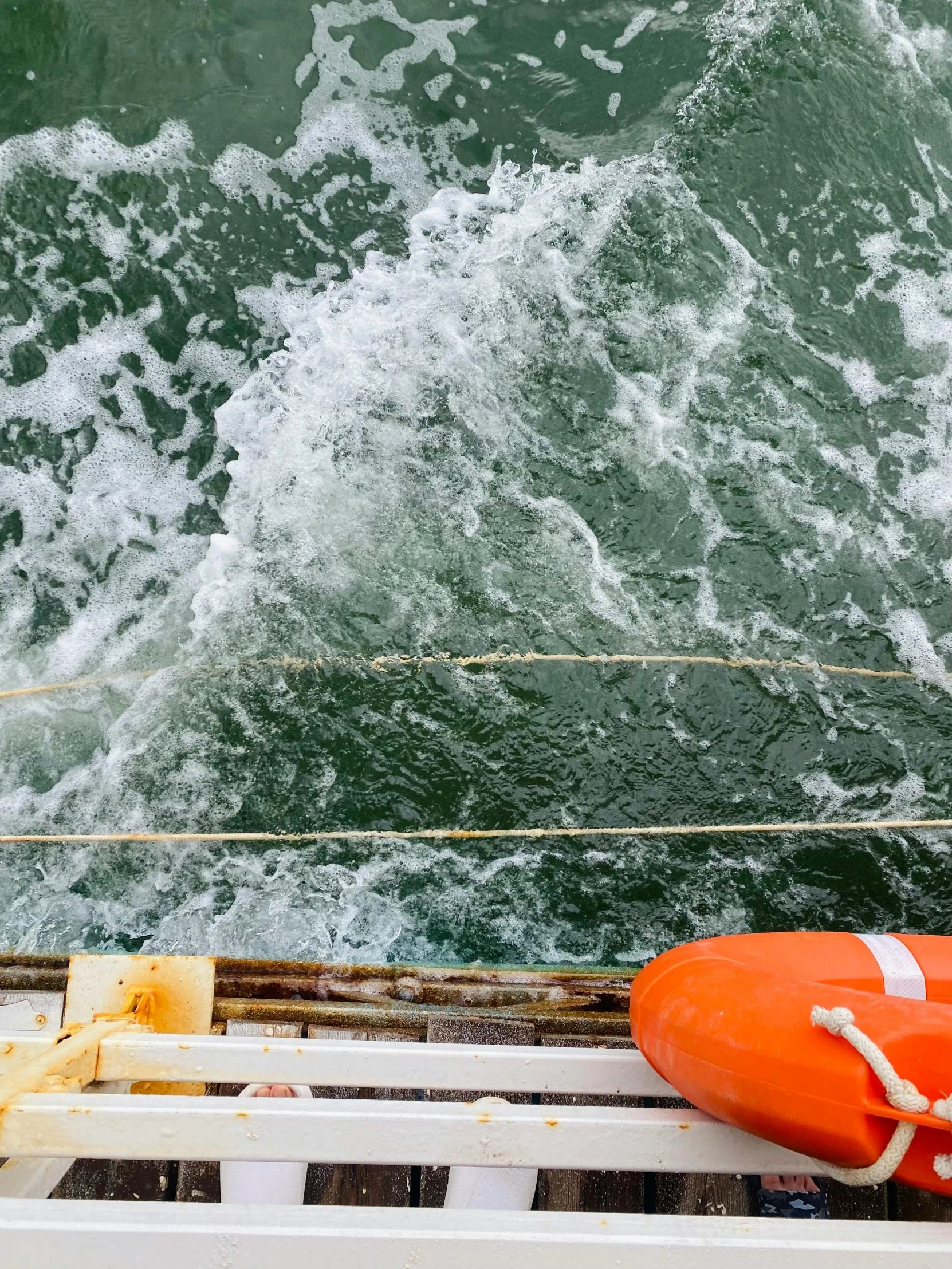 a life jacket and life vest on a boat in rough water