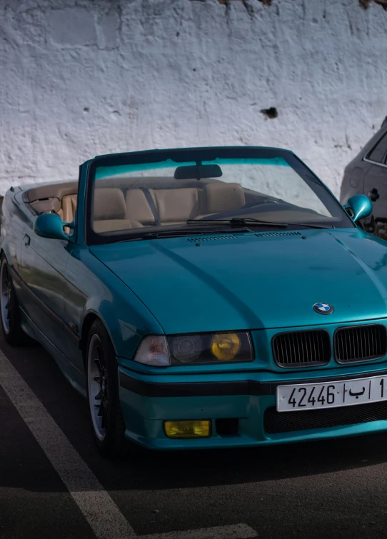 an image of a car that is parked near another car