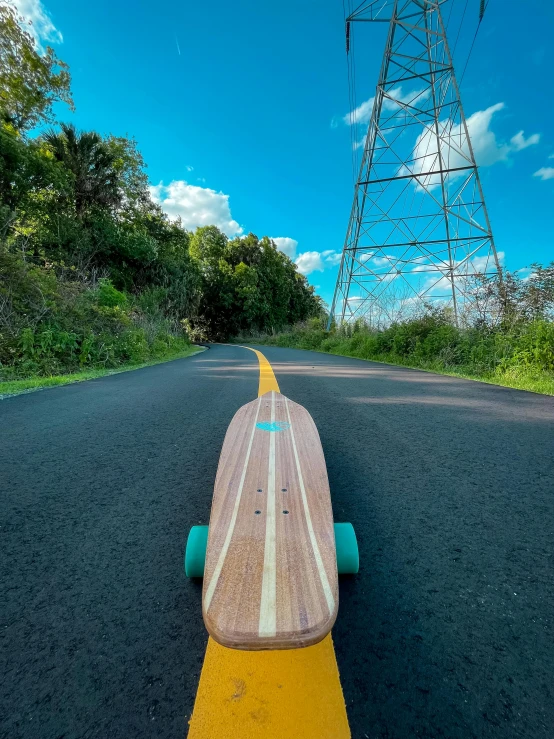 a long board resting on a yellow strip