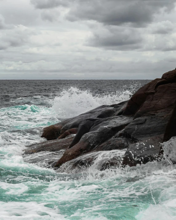 a view of the ocean and some rocks