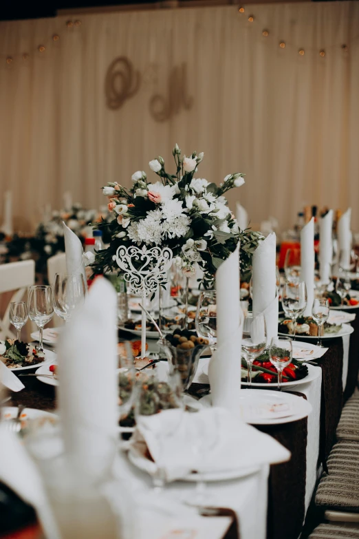 an elegant table setting with candles and flowers