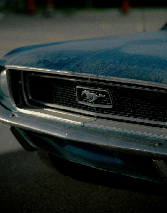 this is an old mustang mustang sitting in the sun