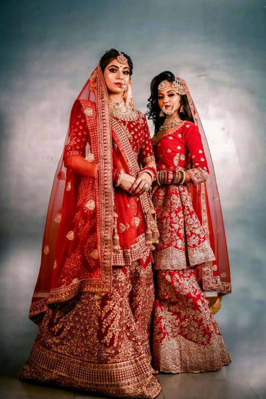 two young women in indian wedding attire